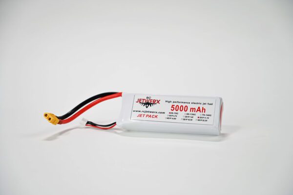 A white battery is connected to a yellow and red wire.